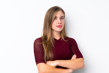 Fototapeta premium Sport teenager girl over isolated white background keeping the arms crossed