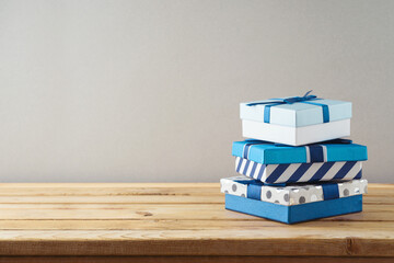 Happy Fathers day concept with gift box on wooden table