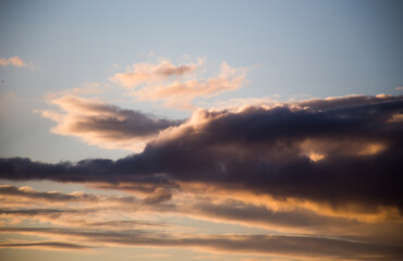 Fototapeta na wymiar Beautiful magnificent clouds at sunset in the sky