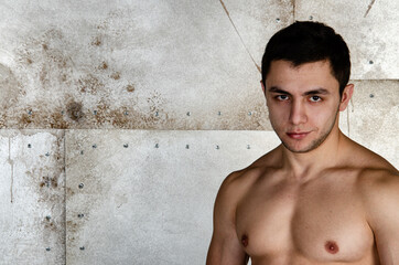 Obraz premium Young athletic sexy man. Beautiful body.