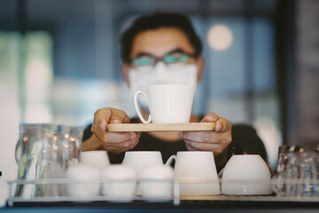 new normal,Coffee shop owner wearing face mask protective for spreading of disease Coronavirus 
