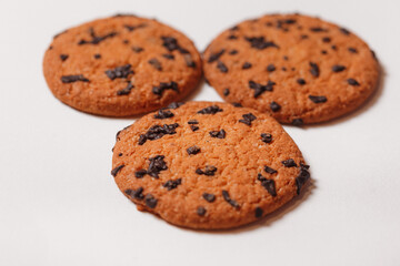 Americano cookies with chocolate chips isolated on white background closeup