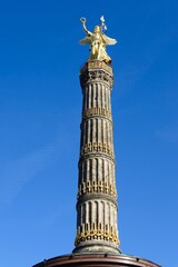 Fototapeta na wymiar Famous Siegessaule on blue sky background in Berlin