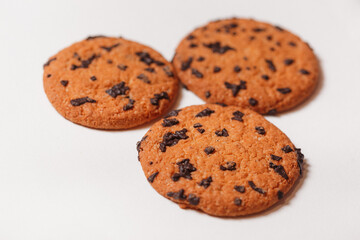 Americano cookies with chocolate chips isolated on white background closeup