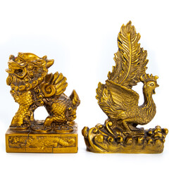 Golden statues ornaments on a white background
