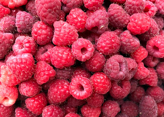 Freshly picked ripe red raspberries, top view