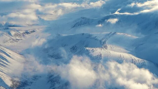 Mountain gorge behind the clouds
