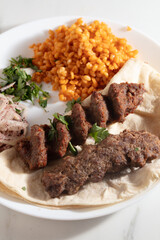 Traditional Adana Kebap with salad
