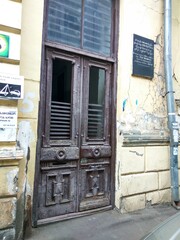 Old brown door in the city of Tbilisi. Georgia.