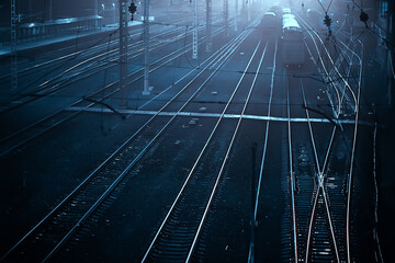 railway tracks night landscape at the railway station fog autumn