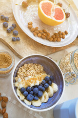 Healthy breakfast with berries, yogurt and oat flakes.