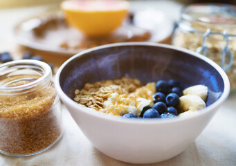 Healthy breakfast with berries, yogurt and oat flakes.