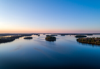 Fototapeta na wymiar An aerial view of the islands of Eagle Lake Ontario, Canada at sunset.