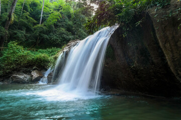 Fototapeta na wymiar Mae Sa waterfall in the forest at Chiang Mai Province