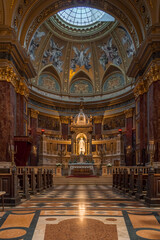 Fototapeta na wymiar Budapest, Hungary - Feb 8, 2020: Ultrawide view of sanctuary nave hall in St. Stephen's Basilica