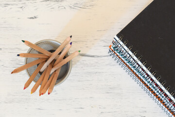 Pencil pot and notebooks