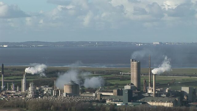 Power station in England Manchester chimneys and smoke