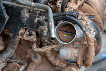 Parts of car's engine, car's engine in fixed process, rusty metal.