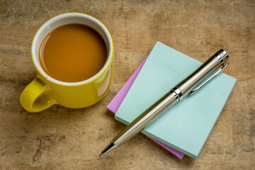 reminder note and napkin abstract, office or coffee break concept