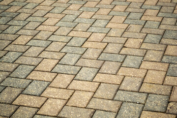 Cubical stone background. Cubical stone pavement on the street.