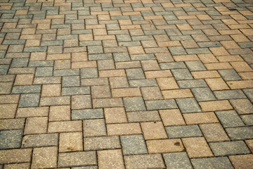 Cubical stone background. Cubical stone pavement on the street.