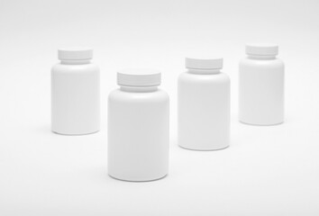 Four white plastic containers for pills for healthy food