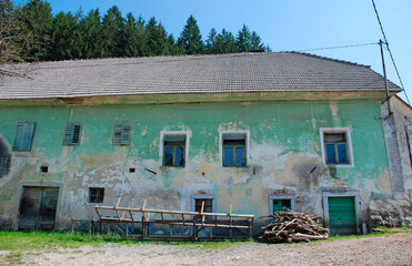 An old derelict building in the Slovenian village of Predjama

