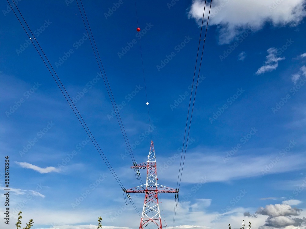 Wall mural power lines with clouds