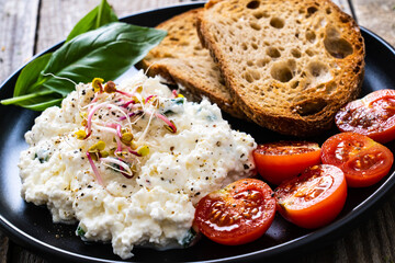 Breakfast - cottage cheese, toasts and vegetables
