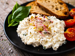 Breakfast - cottage cheese, toasts and vegetables 