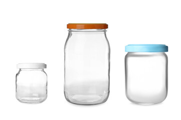 Set with closed empty glass jars on white background