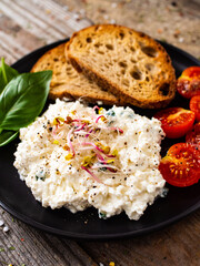 Breakfast - cottage cheese, toasts and vegetables
