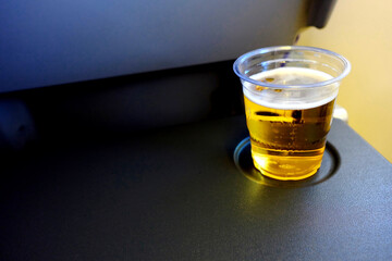 Beer in the Plastic Cup Serving on the Flight.