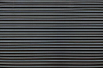 Old Black Striped Metal Wall Texture Background.