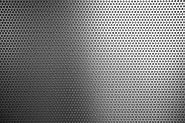 White Punched Metal Sheet Wall Texture Background.