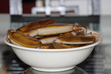 Fresh Oregon Razor Clams in a bowl.