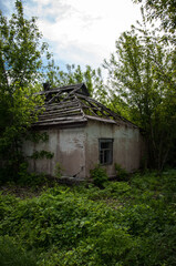 brick and wood ruins of the old house