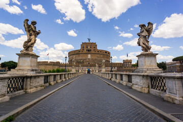 Ponte Sant'Angelo bridge crossing the river Tiber and Castel Sant'Angelo (AD 135) also know as mausoleum of Hadrian in Rome, Italy