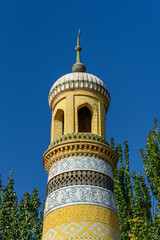 Fototapeta na wymiar Minaret of 15th century Id Kah Mosque in Kashgar, Xinjiang, China. Largest in China.