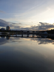 Fototapeta premium the city is reflected in the river