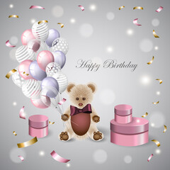 Teddy bear holds balloons sitting among gifts