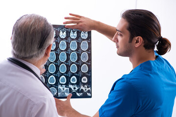 Two male doctors working in the clinic
