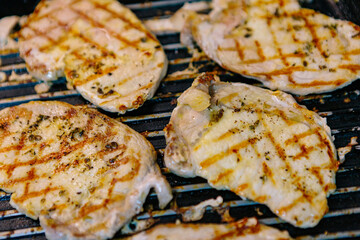 Delicious pork tenderloin cooked on the grill with oil and spices. Real Food.
