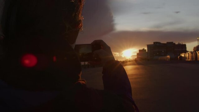 Phone photo sunset take picture shot on RED Helium 8K with 18mm lens at 60fps in RED Gamma 2.2