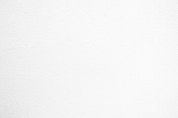 White Concrete Wall Texture Background with Spotlight on Surface.