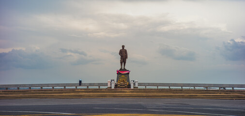 Phatthalung, THAILAND - July 8, 2019: King statue in the beautiful sky at Lampam beach