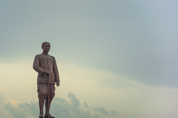 Phatthalung, THAILAND - July 8, 2019: King statue in the beautiful sky at Lampam beach