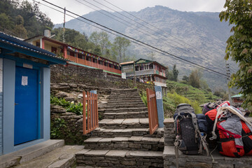 Tea House with Backpacks in Chhomrong in Nepal on Annapurna Base Camp Trek