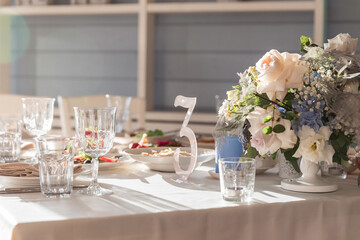 Table set for holiday, event, party or wedding reception in indoor restaurant