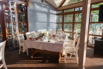 Table set for holiday, event, party or wedding reception in indoor restaurant
